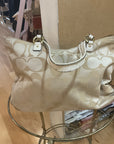 {{Client Code}} TAN COACH PURSE